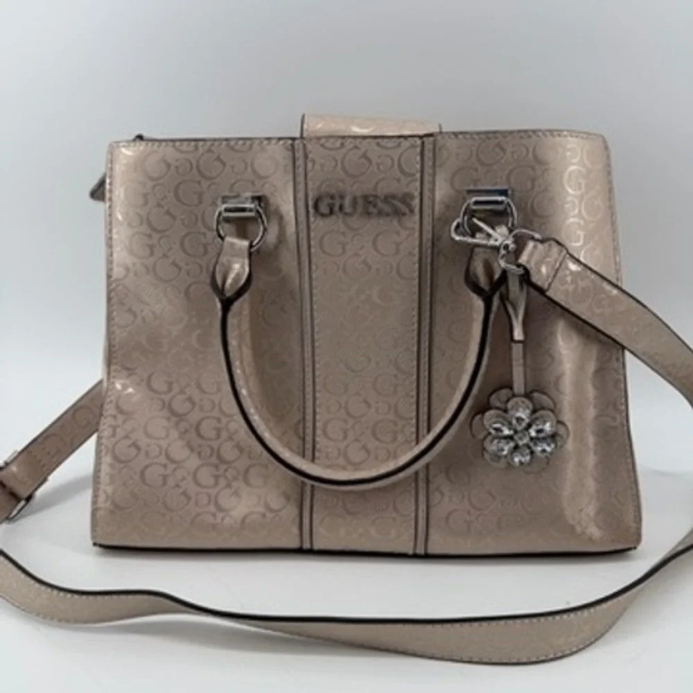 Guess Metallic Champagne Logo Satchel‎ Crossbody Handbag with Flower Charm